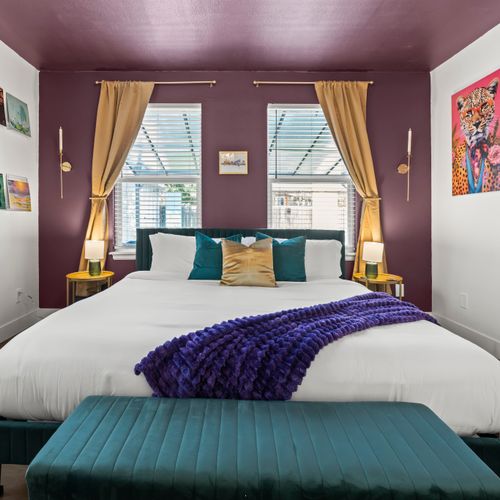 Stylish decor and soft bedding create an ideal experience in the master bedroom.
