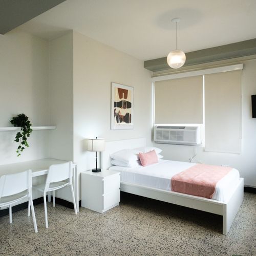 Whether you're traveling for business or pleasure, this room offers a dedicated desk area, providing a quiet spot for productivity or personal planning.