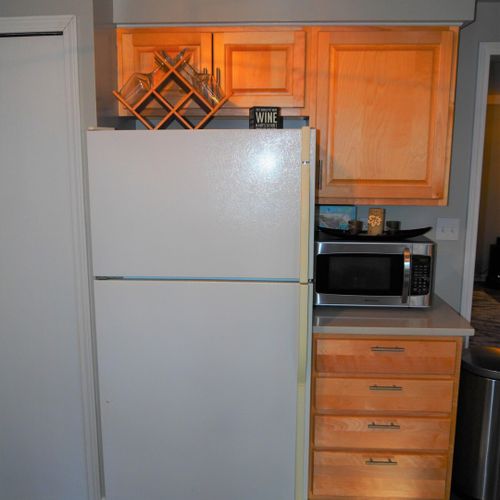 Kitchen:  large kitchen with all appliances (except a dishwasher), including a gas range, toaster, and a keurig coffee maker. Also includes lots of storage space and a good supply of cooking and dining utensils.