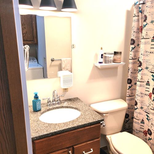 BATHROOM #2:  Full common bathroom that also has a washer and dryer in it.