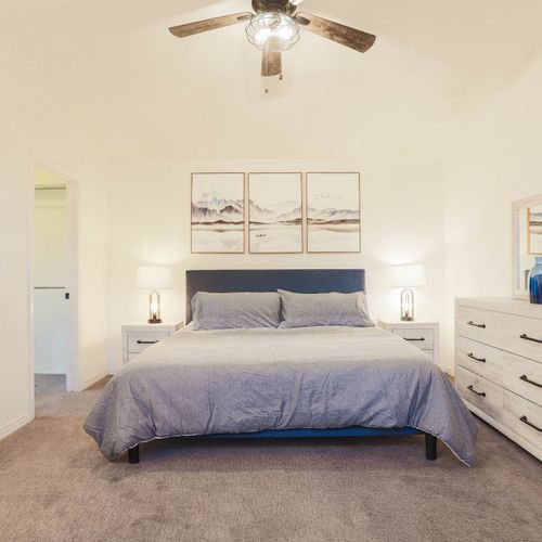 Calm tones and plush bedding for pure comfort.