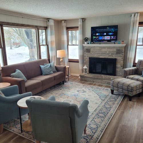 Overall:  the very cute and cozy living room. Note that the indoor wood fireplace is not to be used by guests as it is unsafe to use!
