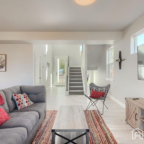Enjoy fun-filled nights in this cozy living room. With plush seating and a large tv, this space is perfect for gathering with family and friends.