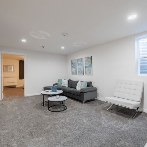 The spacious lower level living room is great for big groups and can seat 10 comfortably.