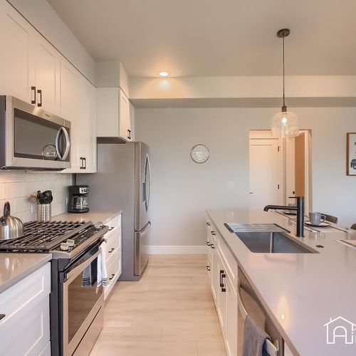 Create memorable meals in the open-concept kitchen/dining room, equipped with all the features you need to whip up something delicious.