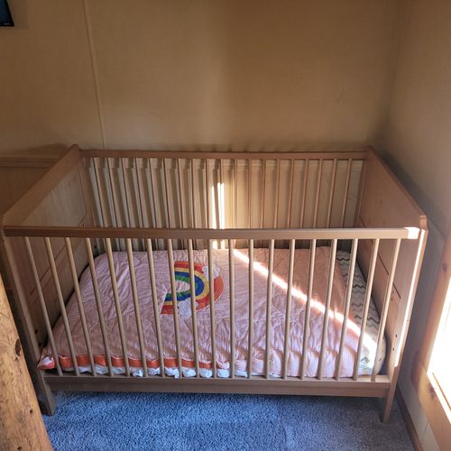 BEDROOM #3 (SECOND FLOOR):  Features a queen-size bed, comfy chair, sofa bed, baby crib, ceiling fan, dresser, and private live-streaming television.