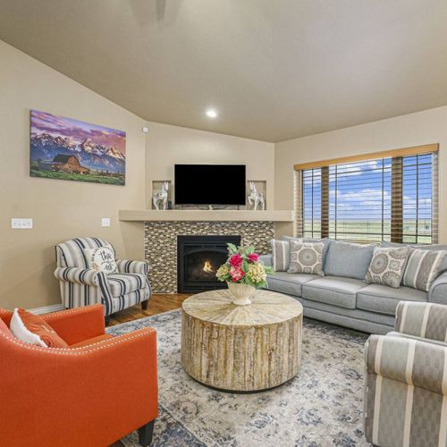 Cozy living room with a gas fireplace—your go-to spot for instant comfort and calm.