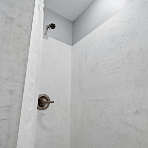 Textured wall detail adding character & warmth to the space.