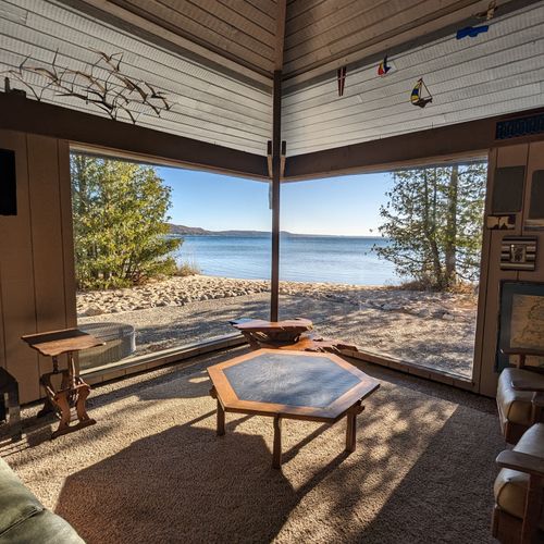 Living room #1:  the beautiful beach view of crystal lake from the cozy interior of the living room