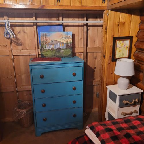 Bedroom #2:  features 2 twin size beds, nightstand, lamp, closet, and dresser