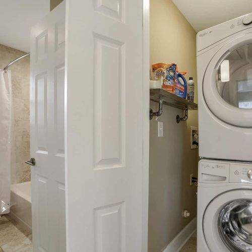 Enjoy the convenience of in-unit laundry with a full washer and dryer, perfectly tucked away in the bathroom. Whether you're here for a short stay or an extended visit, having laundry facilities at your fingertips makes your time in New Orleans even more comfortable.