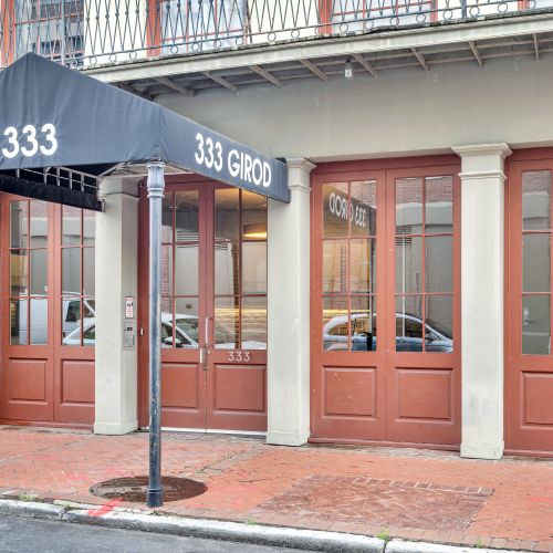 Step through elegant wood & glass doors into your French Quarter retreat.