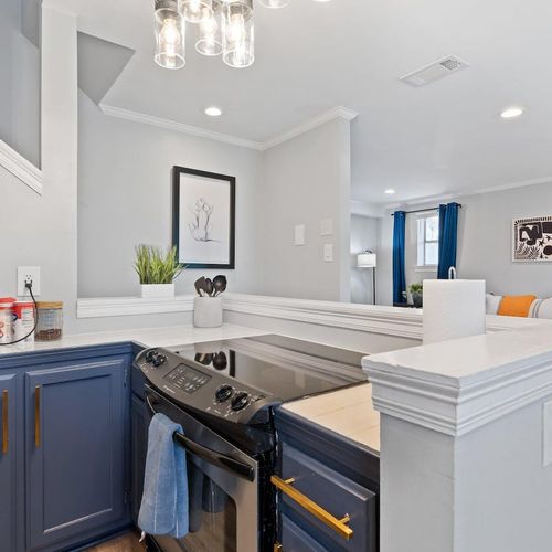 Kitchen opening up to the living room — great flow for entertaining.