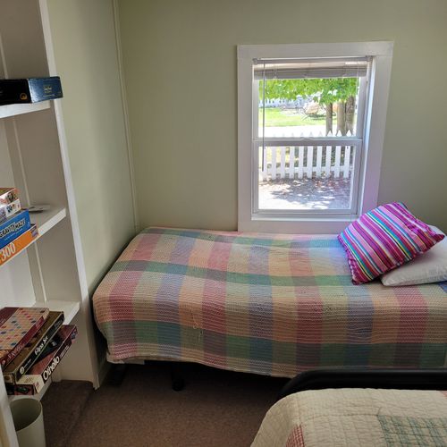 Bedroom #2:  features 2 twin-size beds. (note that there is no door to the bedroom. There is only a curtain. )