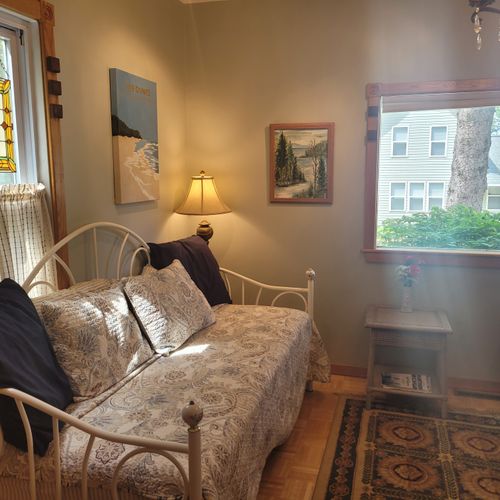 Foyer:  one of the fun and quirky aspects of the home is that in the large front foyer there is a day bed, which include a trundle bed underneath.
