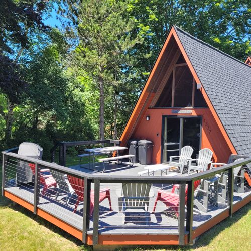 Overall:  the wonderful outdoor deck and the main entrance to the home