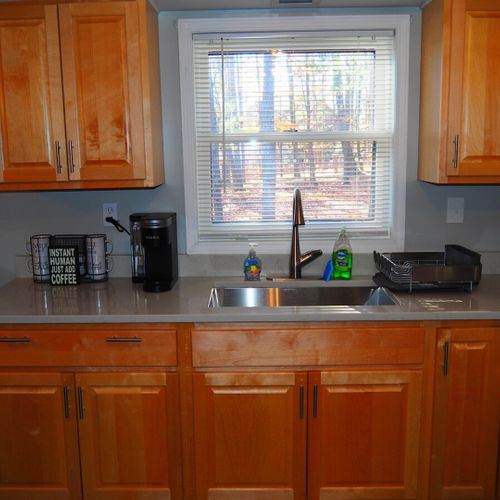 Kitchen:  large kitchen with all appliances (except a dishwasher), including a gas range, toaster, and a keurig coffee maker. Also includes lots of storage space and a good supply of cooking and dining utensils.