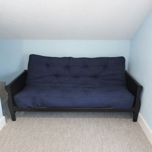 Bedroom #2 (upstairs):  this photo shows the futon in the bedroom. Bedding for the futon is provided.