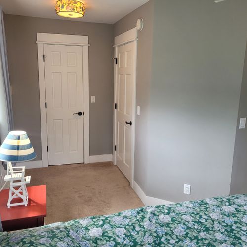 Bedroom #3 (larger house, second floor):  features a queen-size bed, dresser, closet, and great views of lake huron!