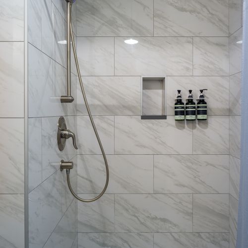 Fresh towels and  Ginger Lily shower amenities