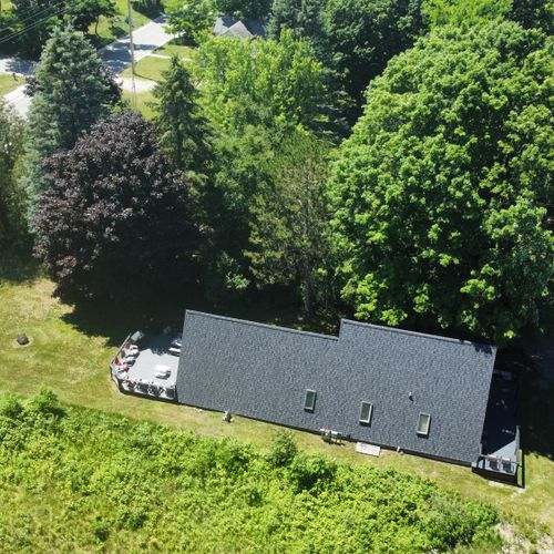Exterior:  aerial view of the property  main street is at the  left end of the photo. The front of the house is on the left and the back of the house is on the right.