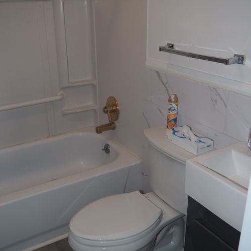 Bathroom:  the cottage has a full bathroom that includes a combination tub and shower.