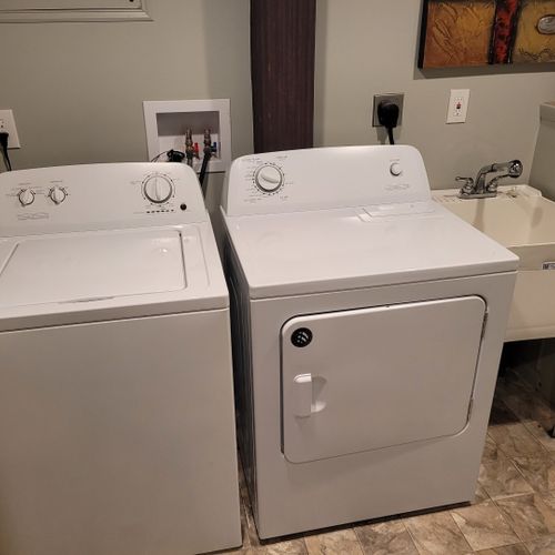 Laundry room (first floor):  very convenient laundry room on the first floor with a washer, dryer, and laundry sink.