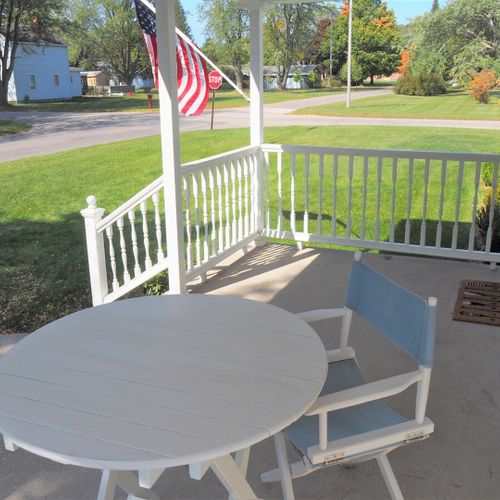 Exterior:  the front porch in summer.