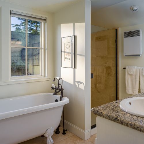 Refresh and recharge in this spa-like bathroom with a soaking tub and walk-in shower.