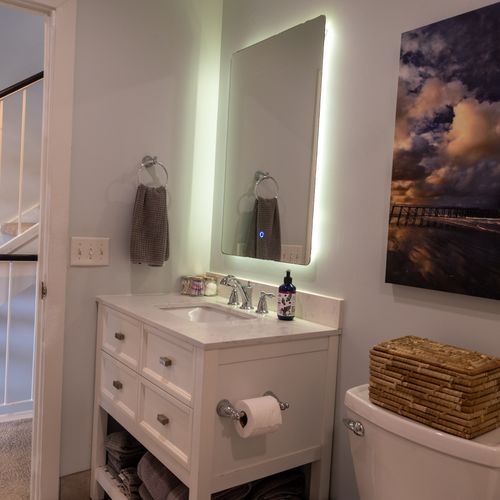 Spot-clean surfaces and bright finishes keep the home feeling fresh and airy.