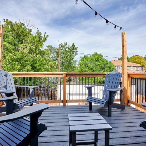 The rooftop patio can be accessed through the first bedroom up the stairs! It has 4 lounge chairs and a table for your enjoyment. Turn on the string lights to enjoy day or night!