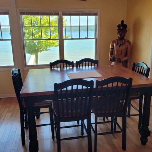 DINING AREA (SECOND FLOOR):  The home has a beautiful dining area with seating for 6 adults and a great view of Crystal Lake.