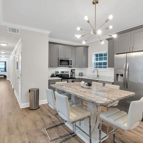 Sleek, fully equipped kitchen ready for home-cooked meals.