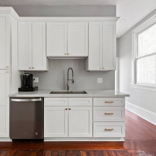 Modern and minimalist kitchenette with all the essentials for your stay. Featuring ample storage, a deep sink, and stainless steel appliances, this space is perfect for preparing a quick meal or brewing your morning coffee.