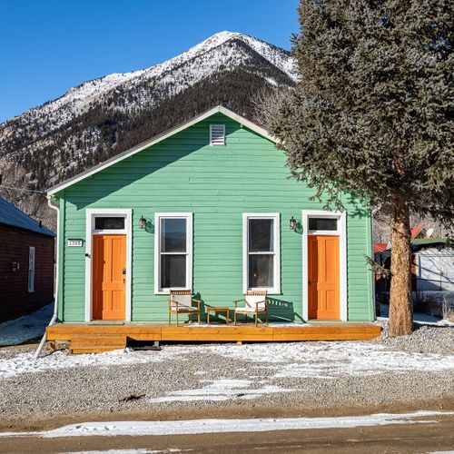 Exterior view of the brothel with a small sitting area for you to enjoy the mountain views.