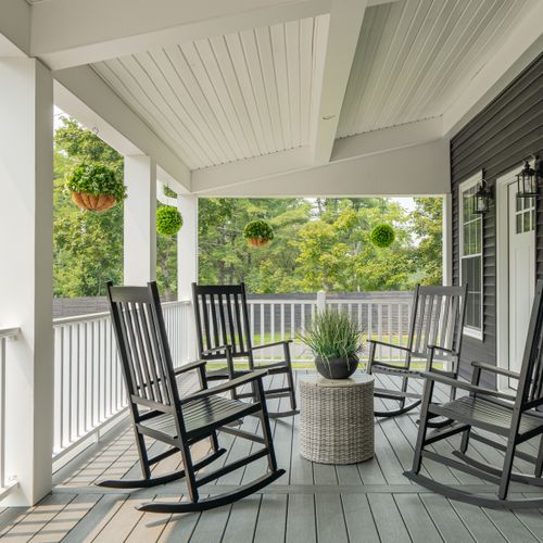 Rocking chairs for four on the front porch.