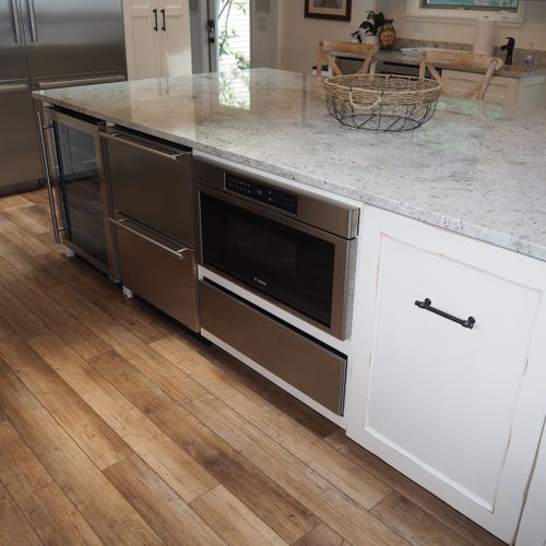 Kitchen:  a second oven, dish drawers, and wine cooler are below the kitchen island.