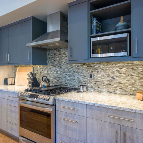 State-of-the-art appliances and custom cabinetry offer you space for your special food items.