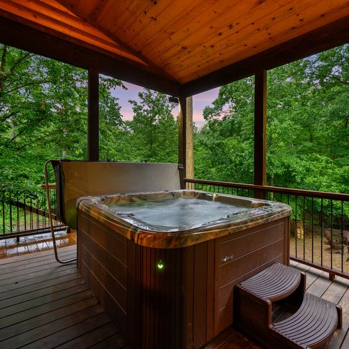 Luxury hot tub on the covered deck!