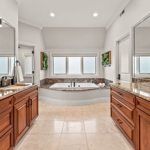 Serenity suite—private bath, elegant design, and plenty of room to relax.