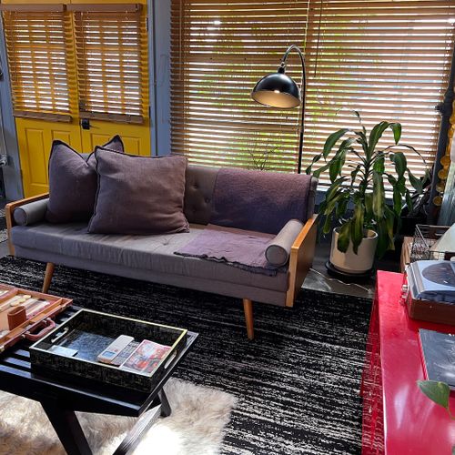 Kick back on the sofa — stream, spin records, or challenge someone to backgammon.