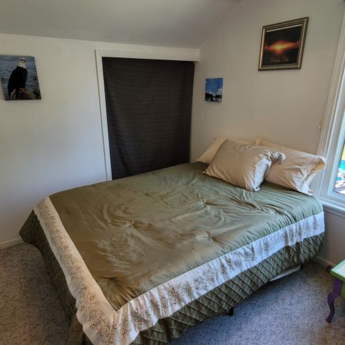 Bedroom #2 ( second floor):  features a full-size bed, a twin bed, a ceiling fan, and a closet.