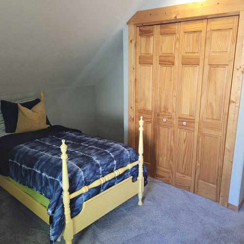 BEDROOM #4 (SECOND FLOOR):  Features 2 twin beds, a closet, a chair, and private live-streaming television.