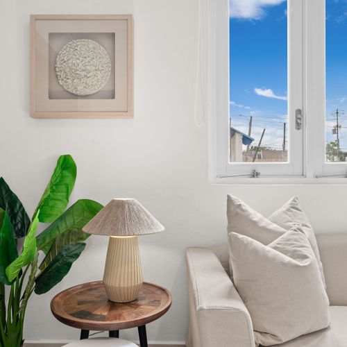 Unwind in this serene space with natural light.