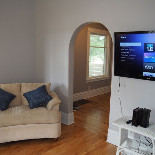 Living room:  the house has a beautifully remodeled and comfy living room that is great for relaxing! The large flat screen television includes streaming services with pureflix, netflix, disney+, and hbo max all included!