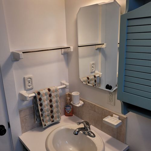 Bathroom #1:  full bathroom with a combination tub and shower.