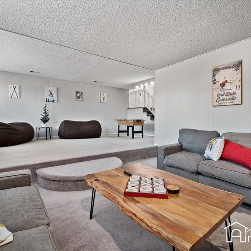 - relax in the basement’s game zone with soft couches, bean bags, and a wood coffee table
- perfect for rainy days or late night hangouts with movies, games, and laughs
- thoughtfully designed for comfort and fun with inviting textures and layout
