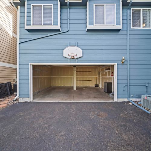 Convenient parking area with direct garage access