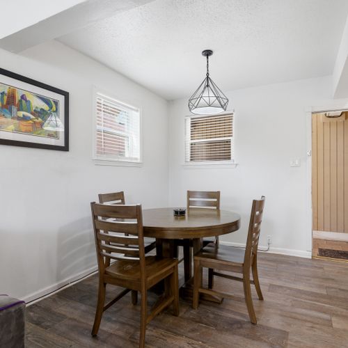 Bright dining space w/ cozy charm for shared meals