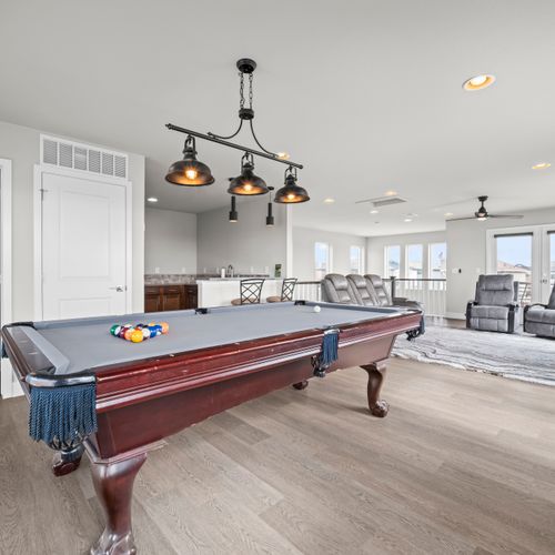 Game on! Pool table ready for competitive, unforgettable nights.